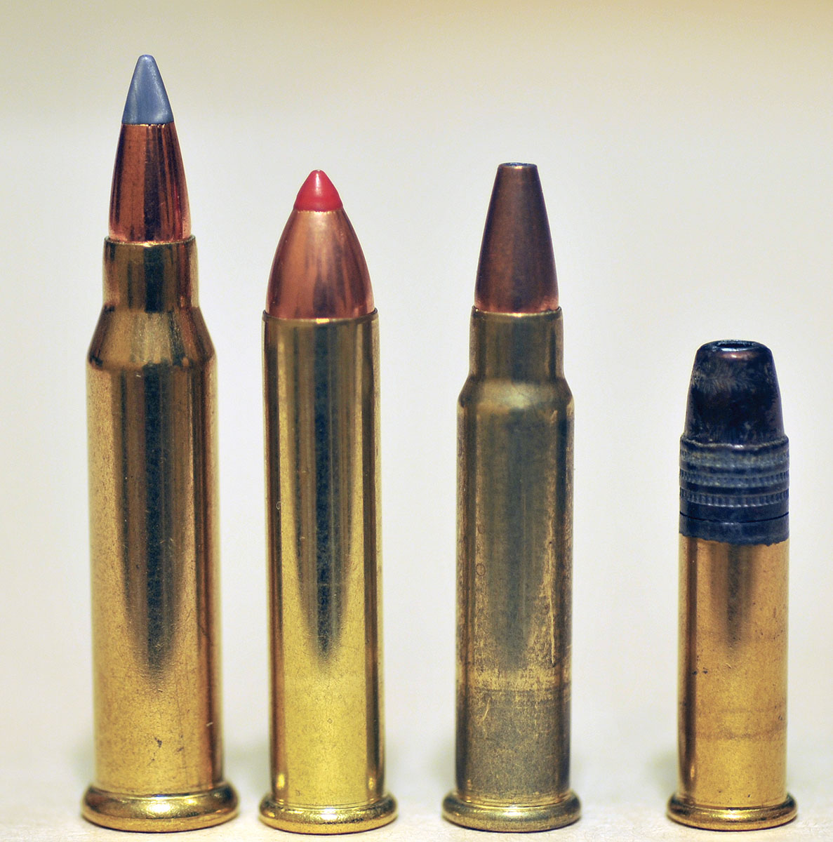 From left: 17 Winchester Super Magnum, 22 Winchester Magnum Rimfire, 17 Hornady Rimfire Magnum and Winchester Power-Point 22 Long Rifle. Note the larger rim thickness on the 17 WSM.
